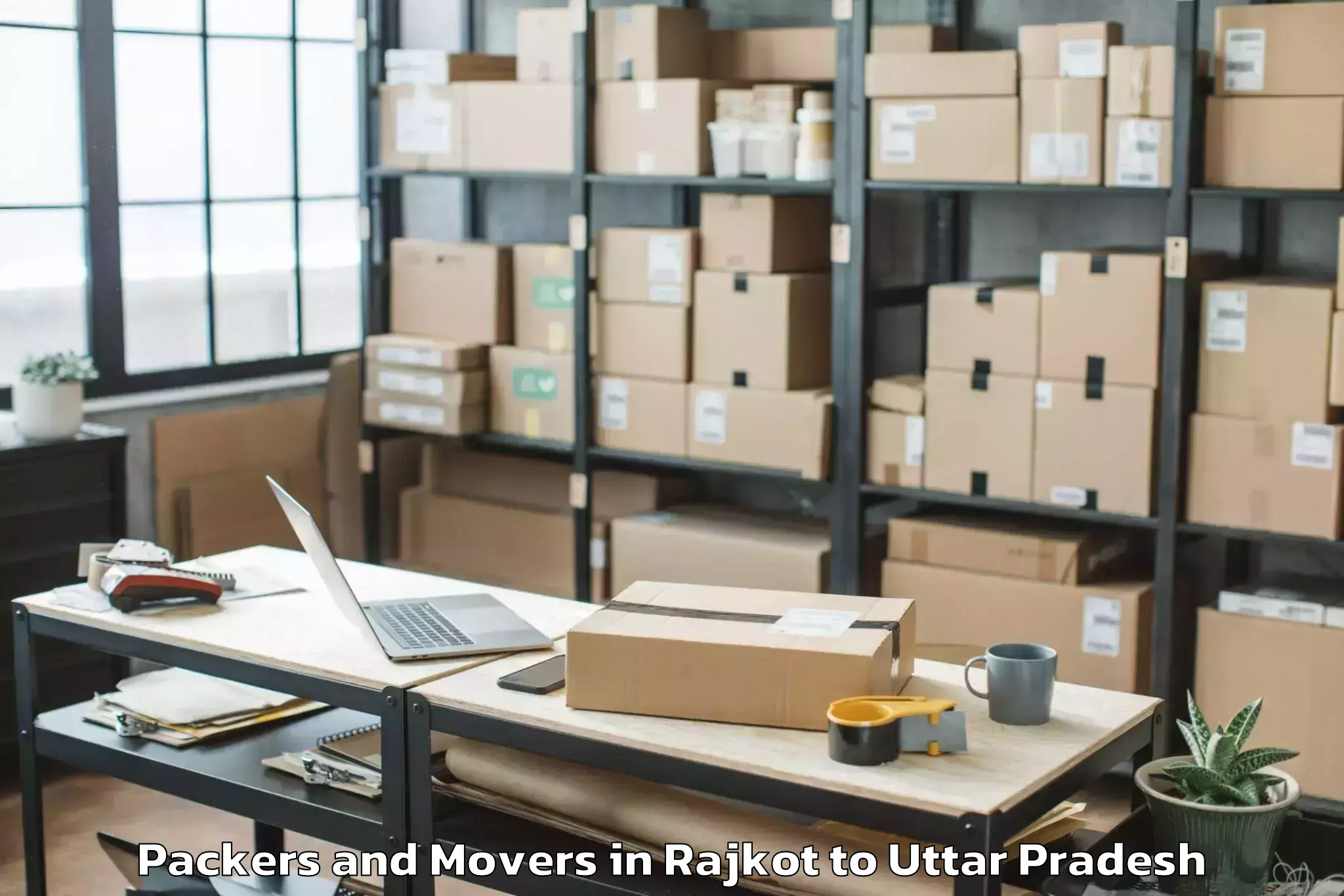 Reliable Rajkot to Manjhanpur Packers And Movers